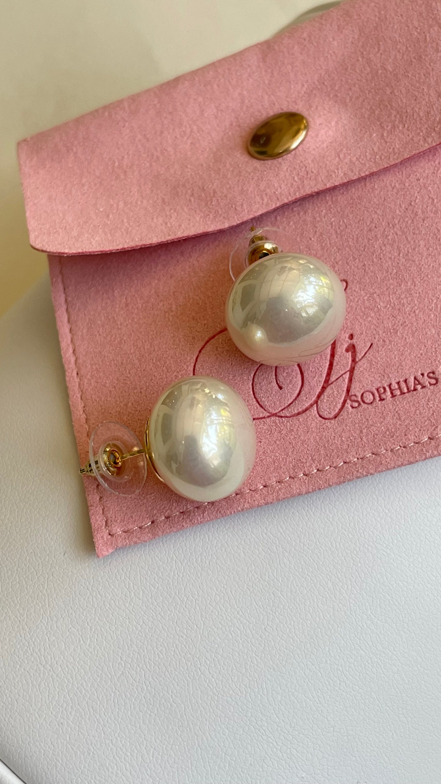 Aretes de perla medianos
