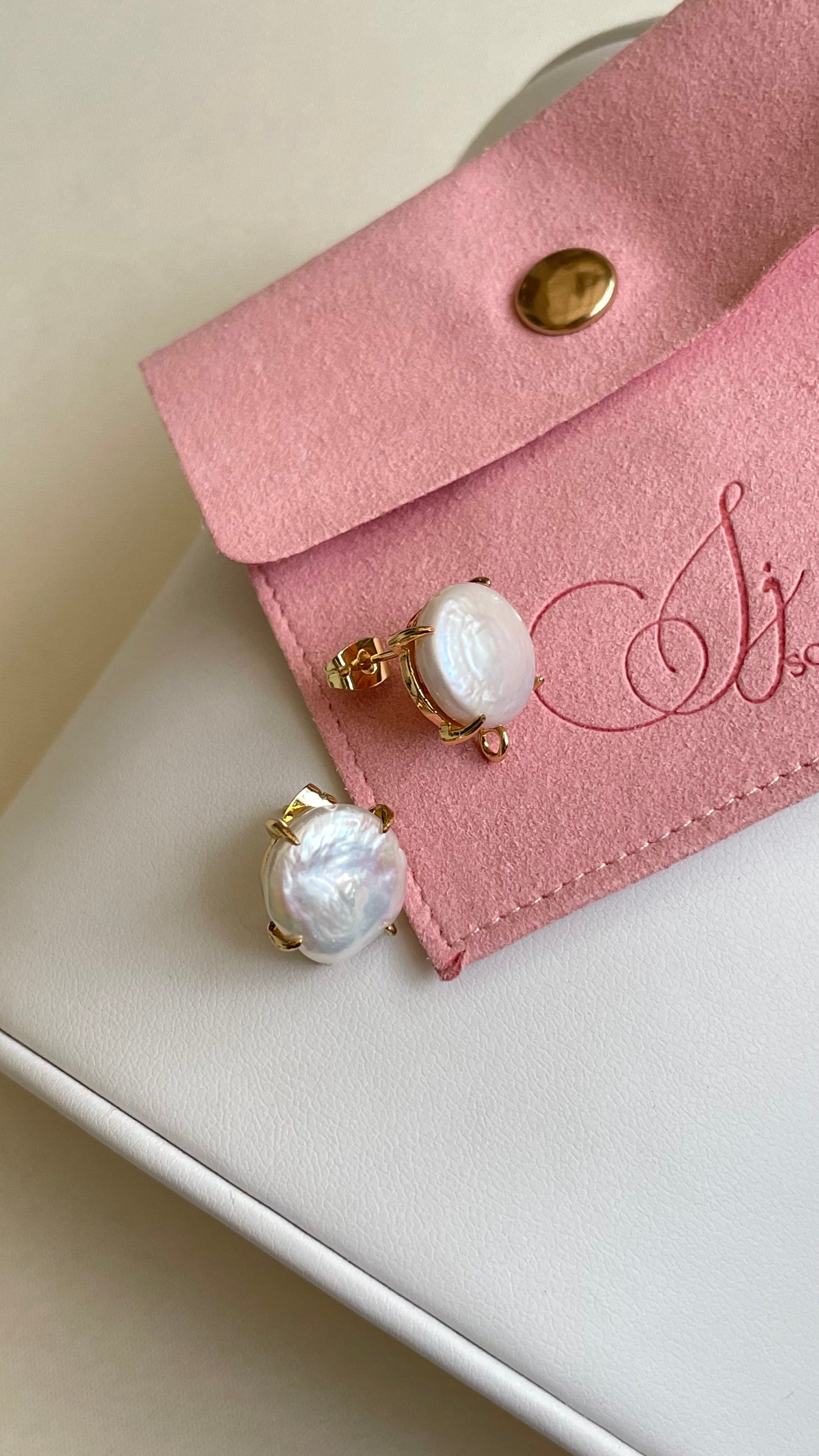 Aretes de perla medianos