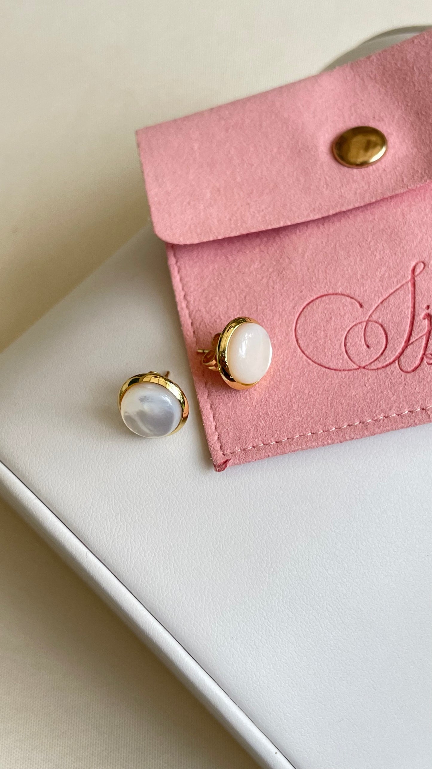 Aretes de perla medianos