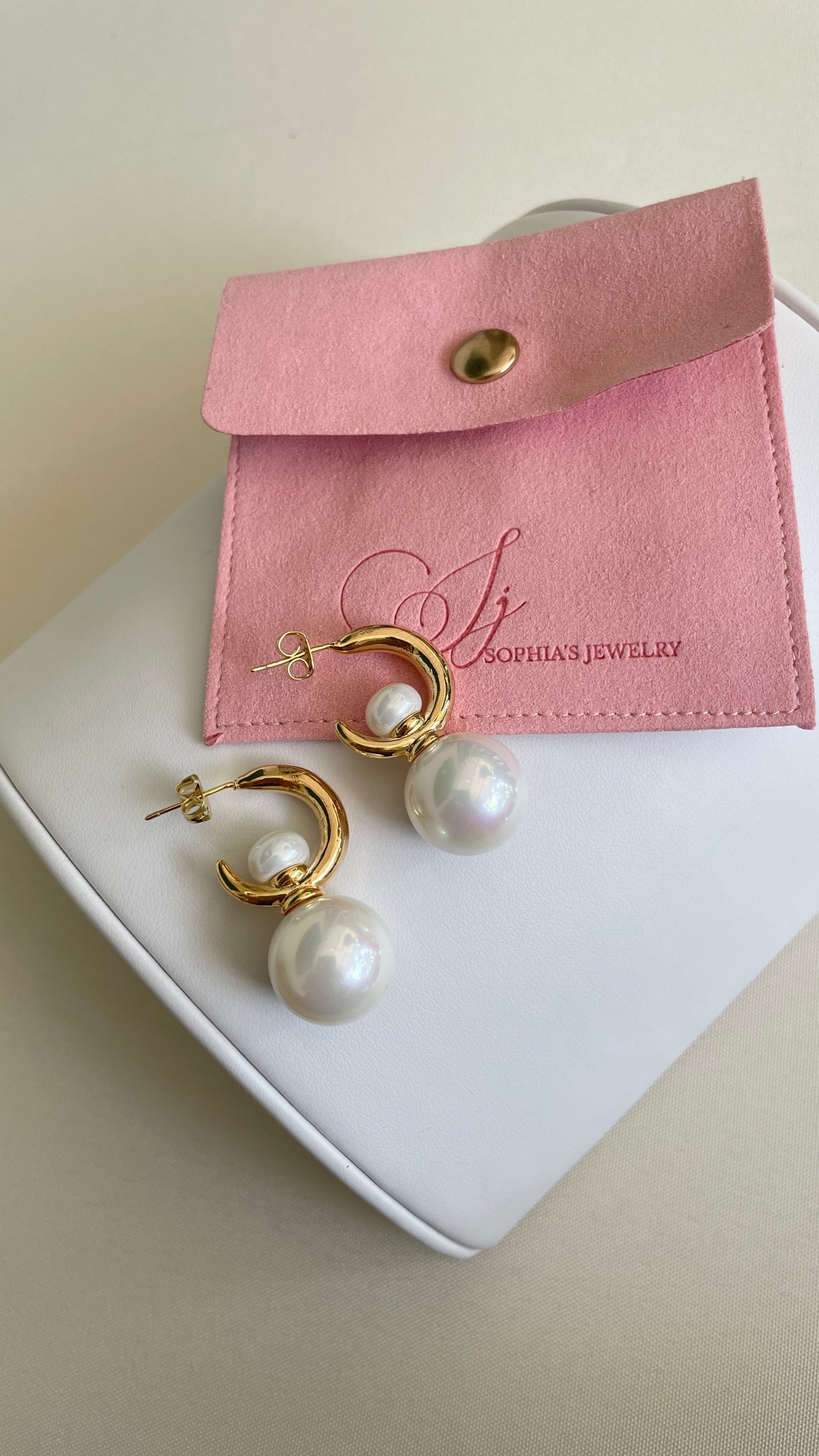 Aretes de perla medianos