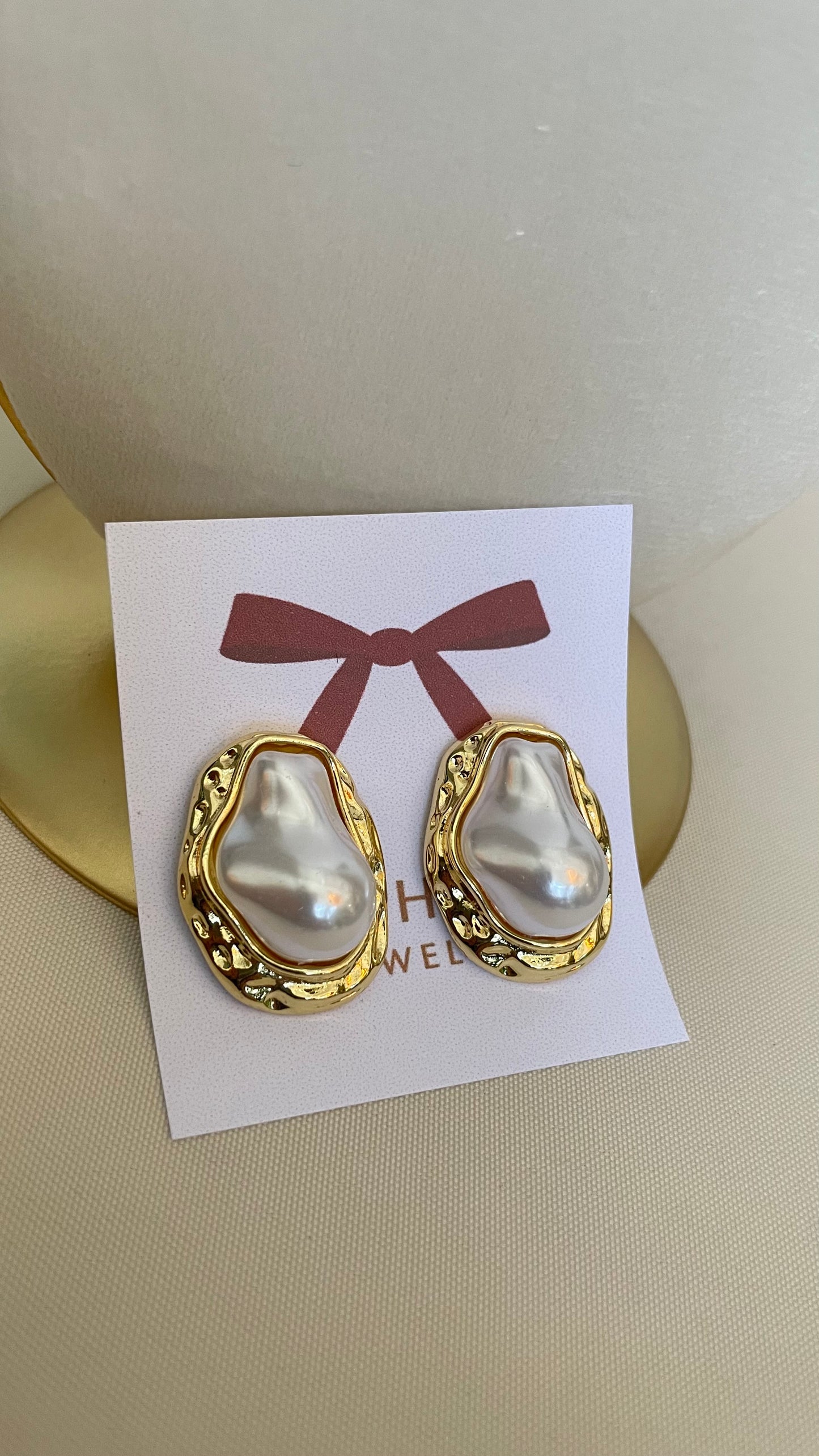 Aretes de perla medianos