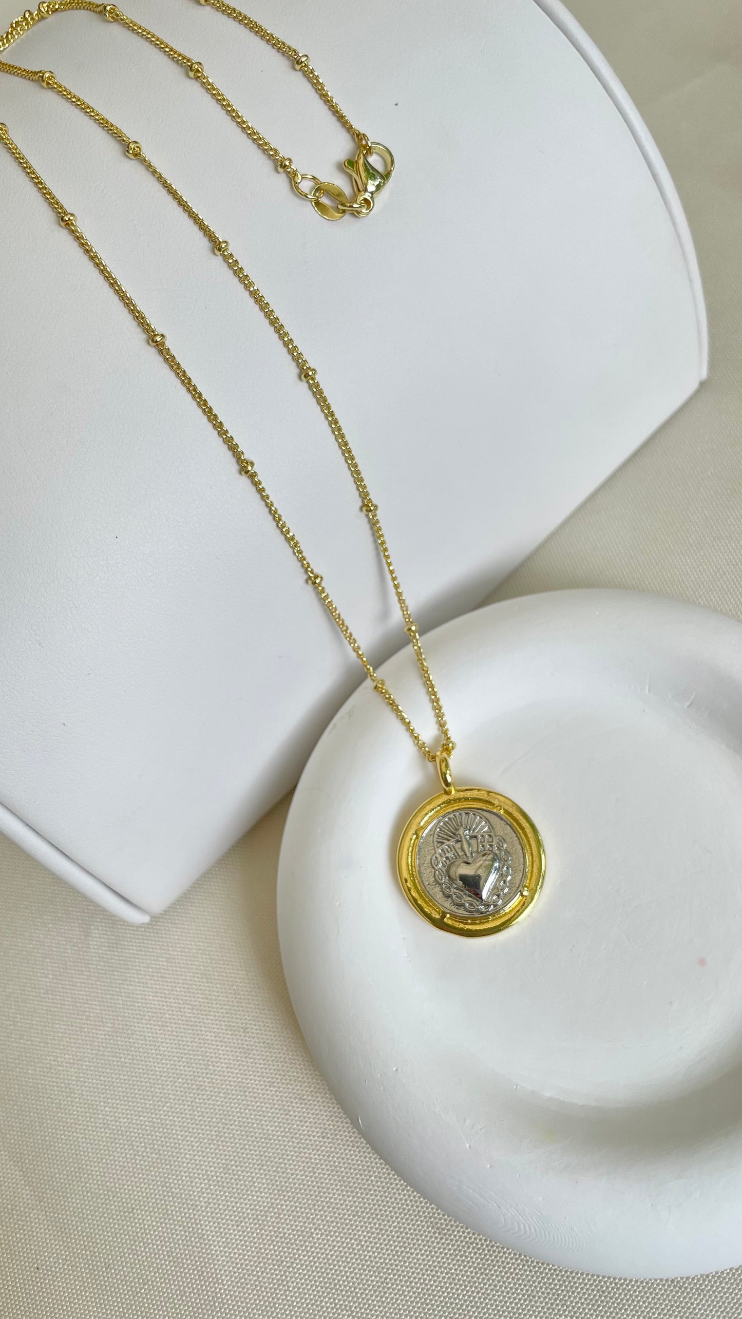 Cadenas medalla religiosa