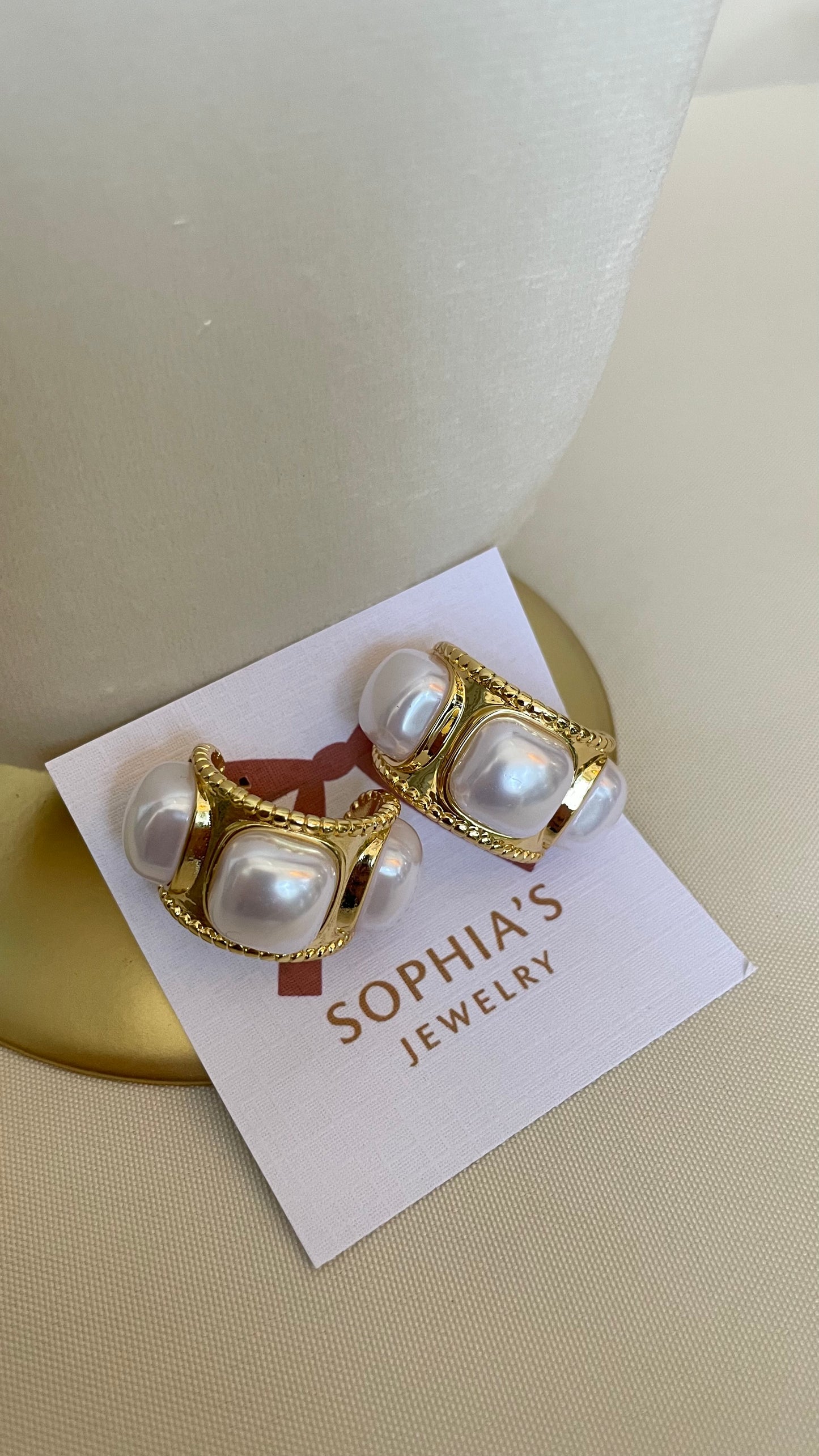 Aretes de perla medianos