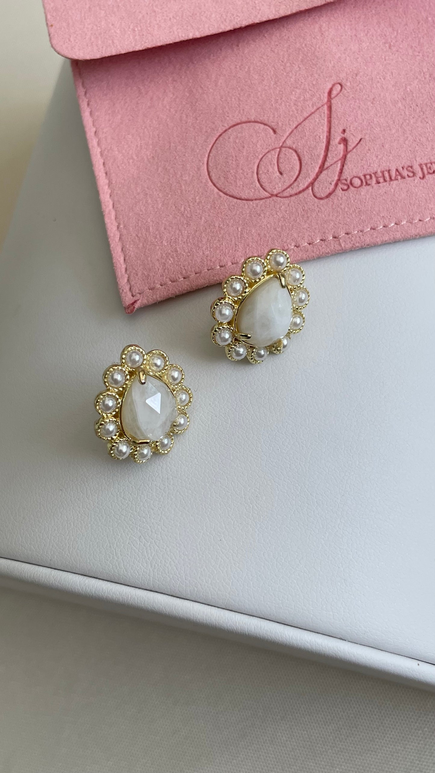 Aretes de perla medianos