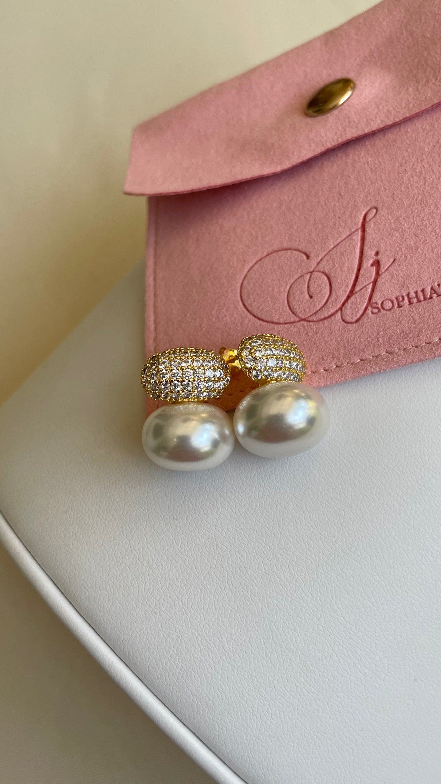 Aretes de perla medianos